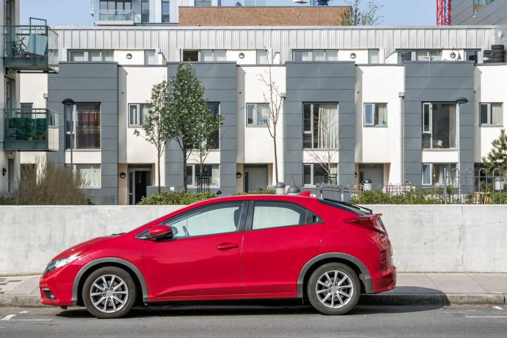 Red car showcasing what happens to your car within the Bankruptcy Expert ultimate bankruptcy guide