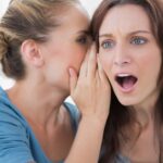 Who will find out you are bankrupt Woman being told a secret by her friend showcasing who will find out you are bankrupt