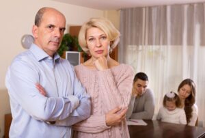 Unhappy senior parents showcasing friends and family debt if you go bankrupt